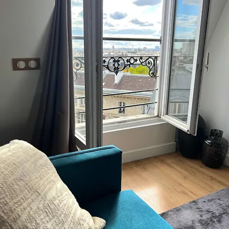 With Fabulous View On Roofs Homestay Paris